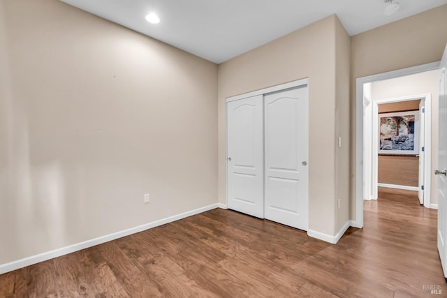 59 Toscana Dr, American Canyon, CA 94503 - unfurnished bedroom featuring wood finished floors, baseboards, and a closet