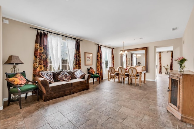 59 Toscana Dr, American Canyon, CA 94503 - living area with baseboards, a chandelier, and stone tile flooring