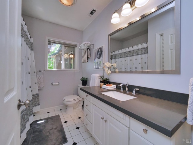 full bath with vanity, tile patterned floors, toilet, a shower with shower curtain, and baseboards