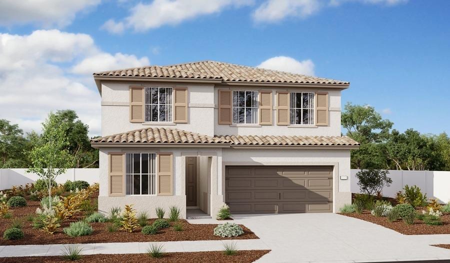 mediterranean / spanish house with fence, a garage, stucco siding, concrete driveway, and a tiled roof