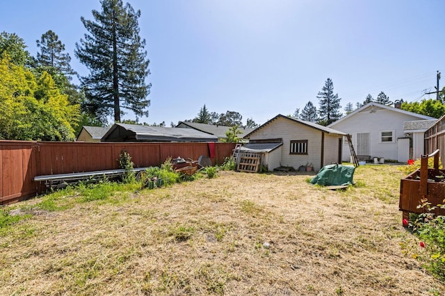 view of yard featuring a fenced backyard