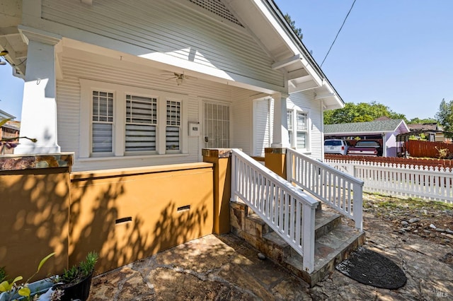 doorway to property with fence