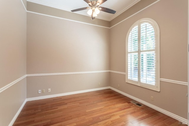 35600 Rock Creek Rd, Shingletown, CA 96088 - empty room with crown molding, ceiling fan, light wood-style floors, baseboards, and visible vents