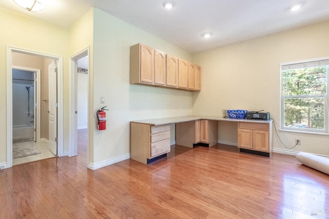 35600 Rock Creek Rd, Shingletown, CA 96088 - home office featuring baseboards, light wood finished floors, and built in desk