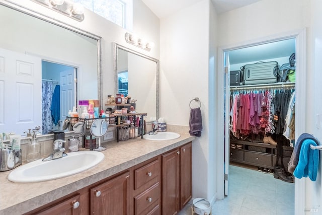 35600 Rock Creek Rd, Shingletown, CA 96088 - full bathroom featuring double vanity, a spacious closet, and a sink