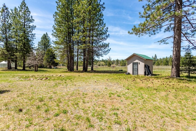 35600 Rock Creek Rd, Shingletown, CA 96088 - view of yard with an outdoor structure and a storage unit