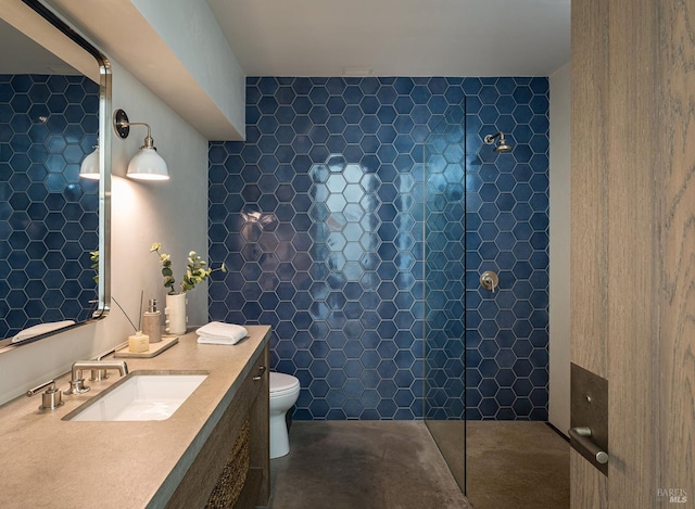 full bathroom featuring a walk in shower, toilet, and vanity