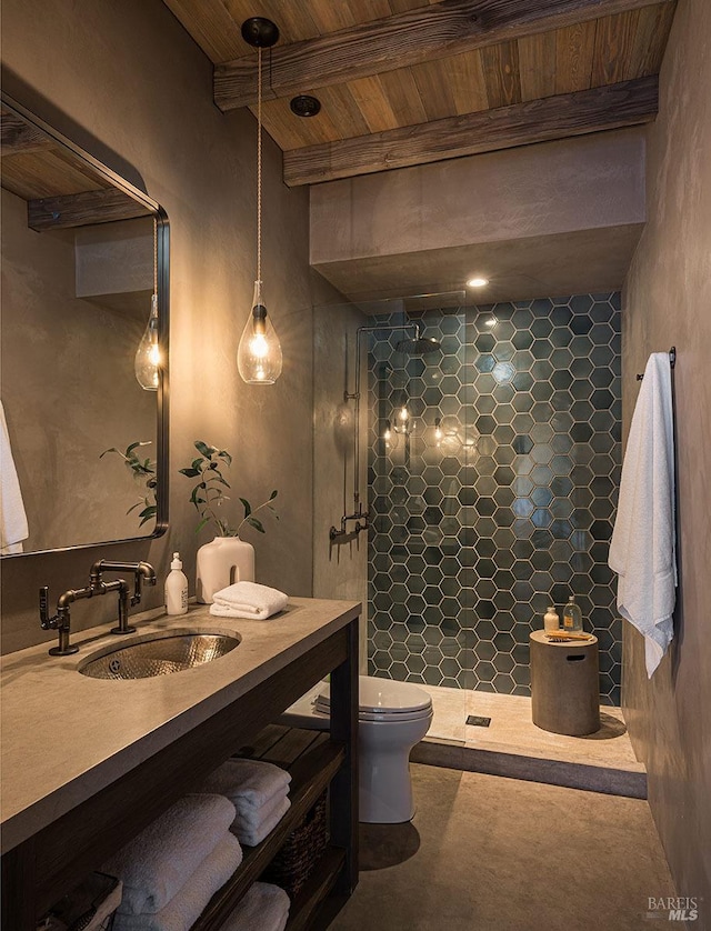 bathroom featuring wooden ceiling, vanity, beamed ceiling, toilet, and tiled shower