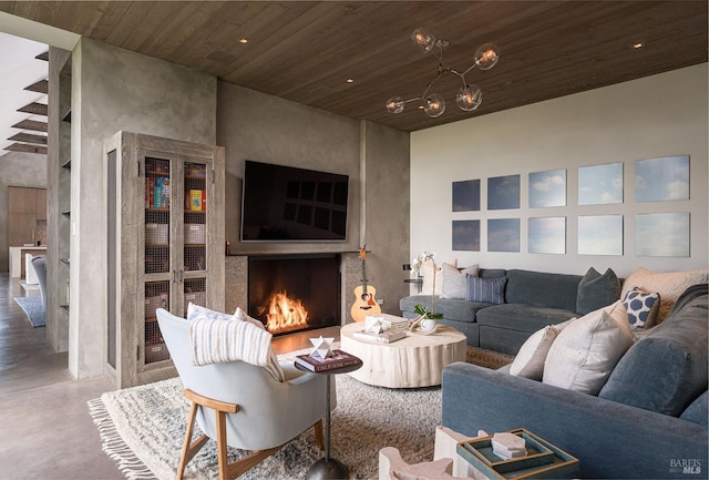 living room featuring concrete flooring, wood ceiling, and a fireplace