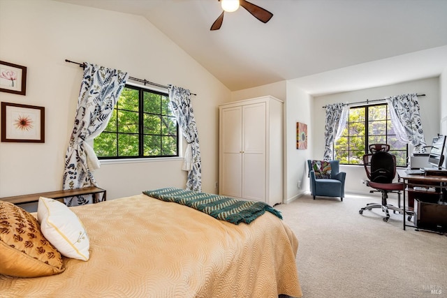 bedroom featuring baseboards, ceiling fan, carpet, and lofted ceiling