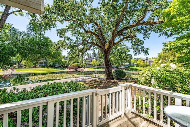 deck featuring a water view