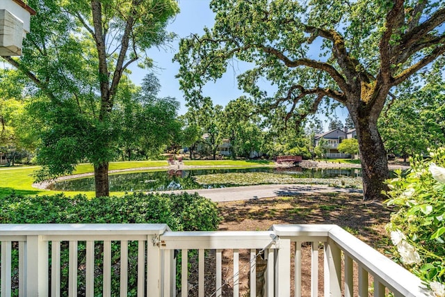 view of yard with a balcony