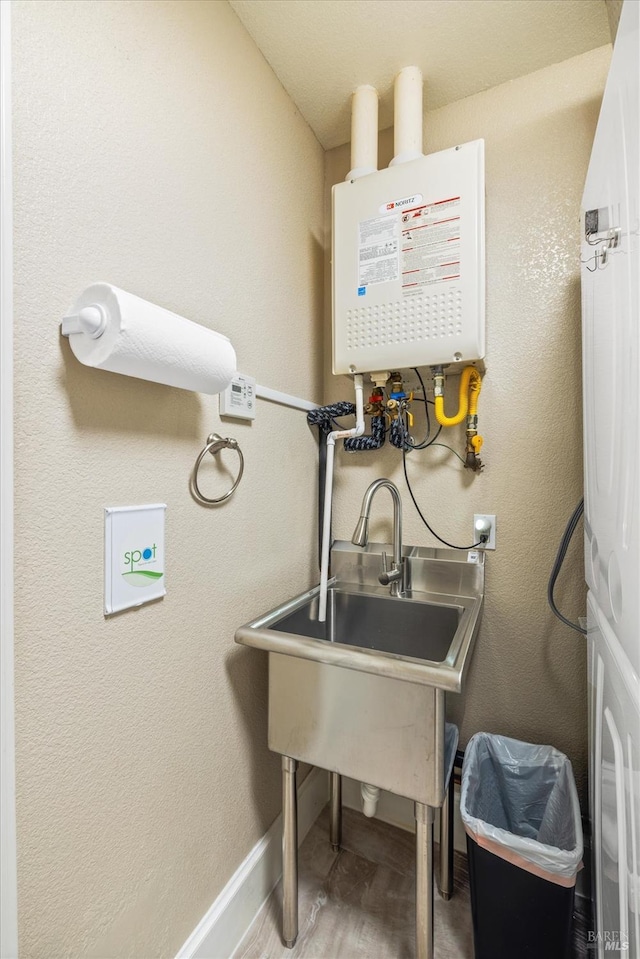 utility room with water heater