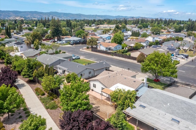 birds eye view of property featuring a mountain view and a residential view