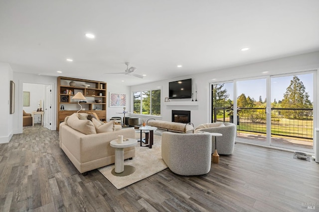 3314 Gravenstein Hwy S, Sebastopol, CA 95472 - living room featuring a glass covered fireplace, wood finished floors, recessed lighting, and ceiling fan