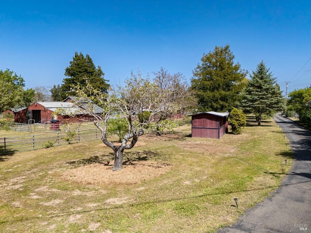 3314 Gravenstein Hwy S, Sebastopol, CA 95472 - view of yard with fence, an outdoor structure, and a storage unit