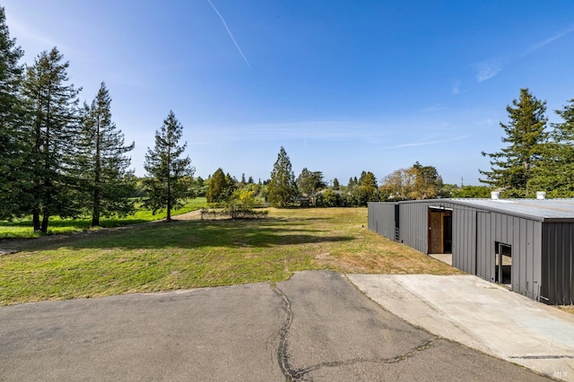 3314 Gravenstein Hwy S, Sebastopol, CA 95472 - view of grassy yard with a pole building and an outdoor structure