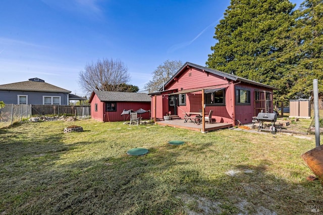 3314 Gravenstein Hwy S, Sebastopol, CA 95472 - back of property with a wooden deck, a storage shed, and an outdoor structure