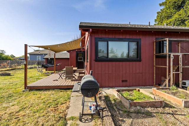 3314 Gravenstein Hwy S, Sebastopol, CA 95472 - back of house with a wooden deck and a vegetable garden