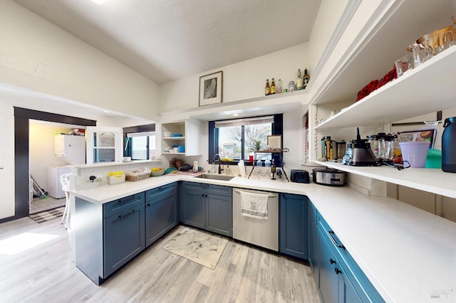 3314 Gravenstein Hwy S, Sebastopol, CA 95472 - kitchen with stainless steel dishwasher, open shelves, light wood-type flooring, a peninsula, and a sink
