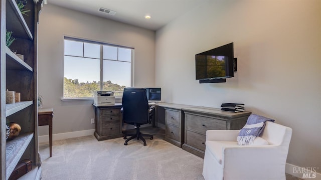 office featuring visible vents, recessed lighting, baseboards, and light carpet
