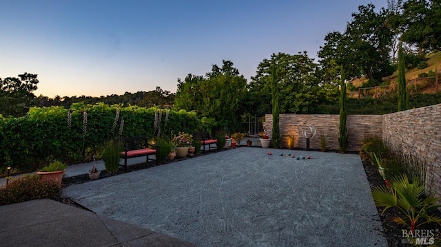 view of patio / terrace featuring fence