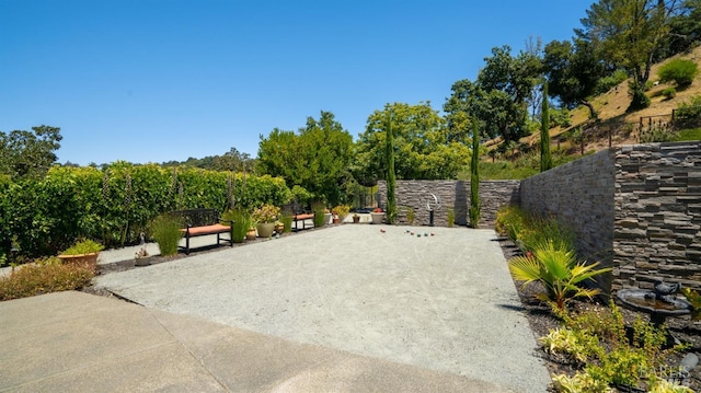 surrounding community featuring fence