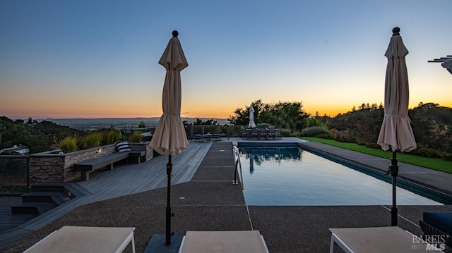 pool with a patio area