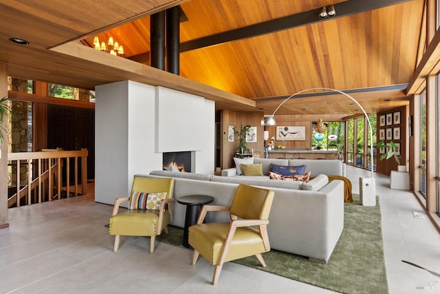1499 Rockville Rd, Fairfield, CA 94534 - tiled living area featuring a large fireplace, wood ceiling, wood walls, and a towering ceiling