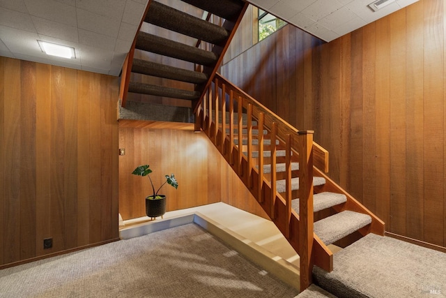 1499 Rockville Rd, Fairfield, CA 94534 - stairway with wooden walls and carpet flooring