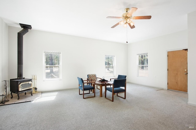 12321 Big Springs Blvd, Old Station, CA 96071 - carpeted dining room with a wood stove and ceiling fan