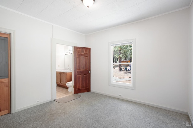 12321 Big Springs Blvd, Old Station, CA 96071 - unfurnished bedroom featuring ornamental molding, carpet floors, baseboards, ensuite bath, and a sink