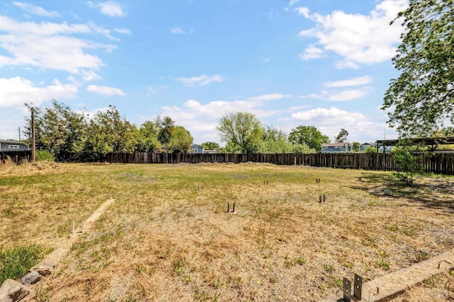 view of yard with fence