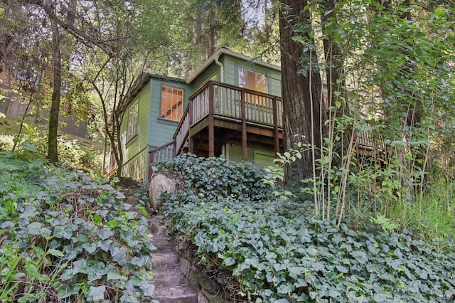 rear view of house with a deck