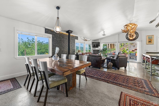 22855 Chianti Rd, Geyserville, CA 95441 - dining area with speckled floor, baseboards, vaulted ceiling, and a ceiling fan