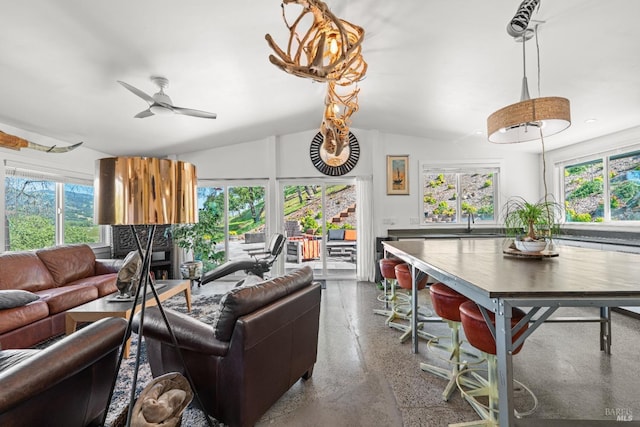 22855 Chianti Rd, Geyserville, CA 95441 - living area featuring light speckled floor, healthy amount of natural light, a ceiling fan, and a fireplace