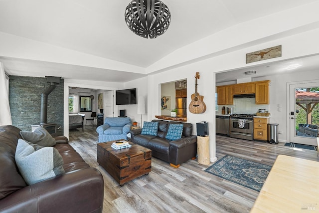 22855 Chianti Rd, Geyserville, CA 95441 - living room with a wood stove, light wood-type flooring, and lofted ceiling