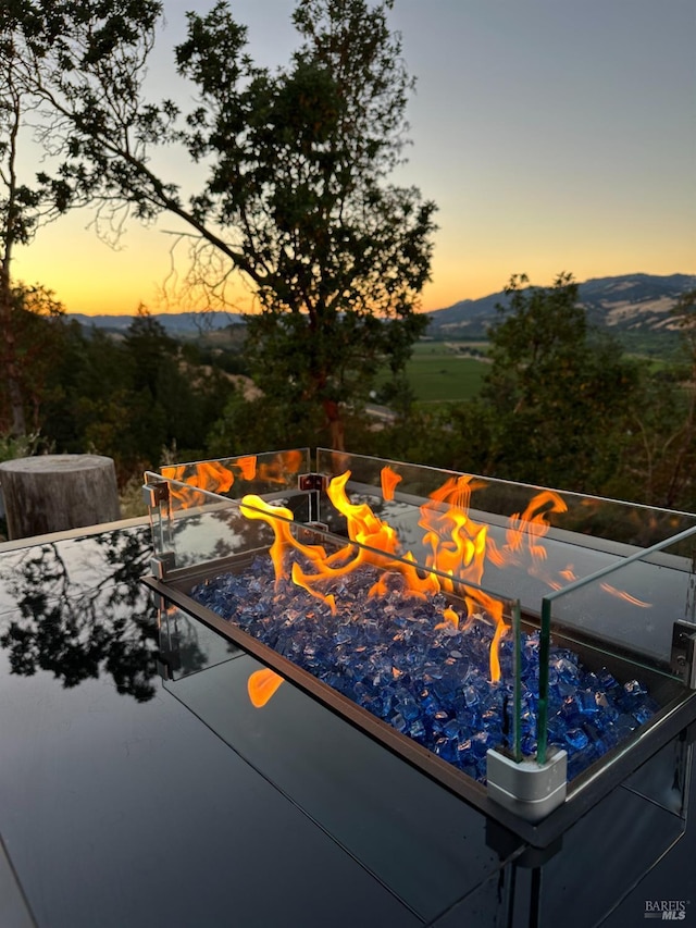 22855 Chianti Rd, Geyserville, CA 95441 - pool at dusk with a fire pit and a mountain view