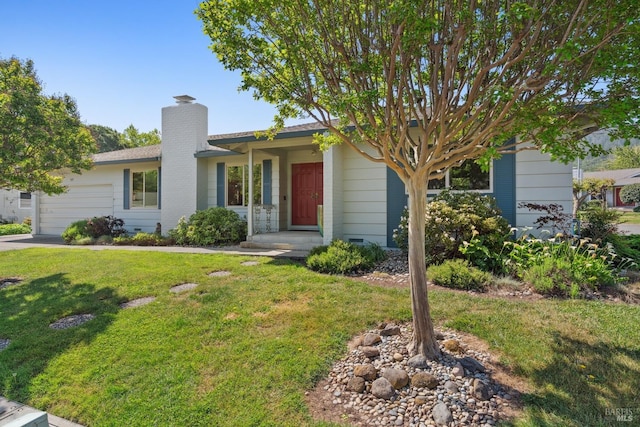 single story home with a chimney, a garage, and a front yard