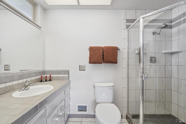 full bath featuring visible vents, tile patterned flooring, a stall shower, vanity, and toilet