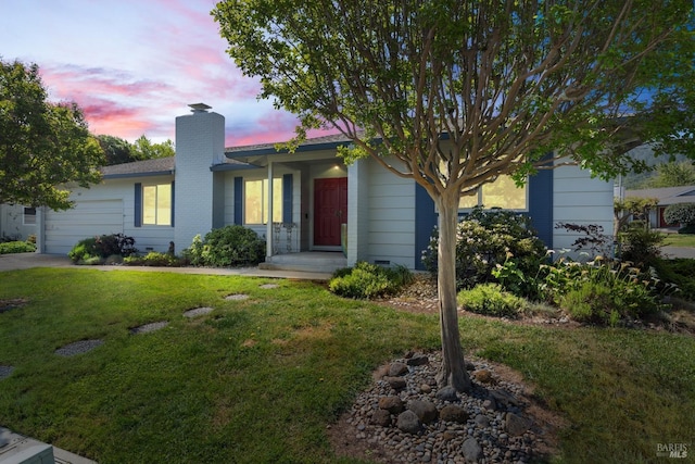 single story home featuring a garage, a chimney, and a front yard