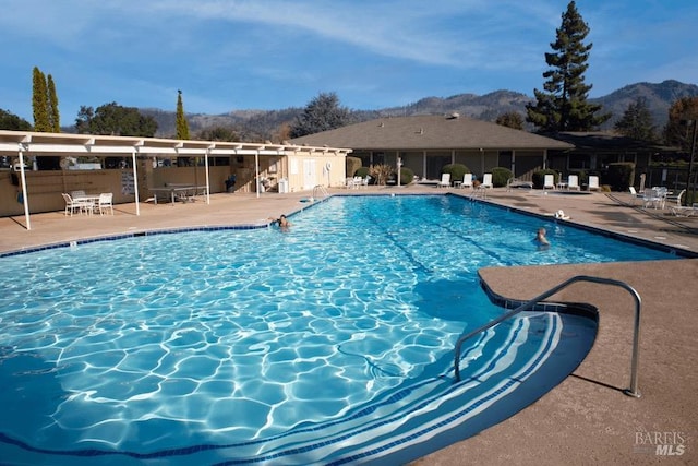 505 Oak Vista Ct, Santa Rosa, CA 95409 - community pool featuring a mountain view and a patio area