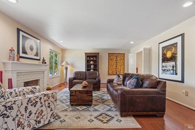 living room featuring recessed lighting and wood finished floors