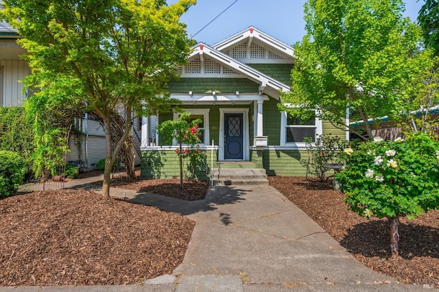 craftsman inspired home featuring covered porch