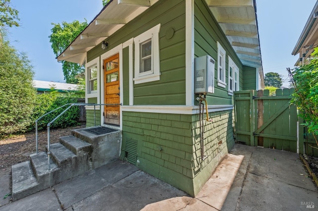 exterior space featuring a gate