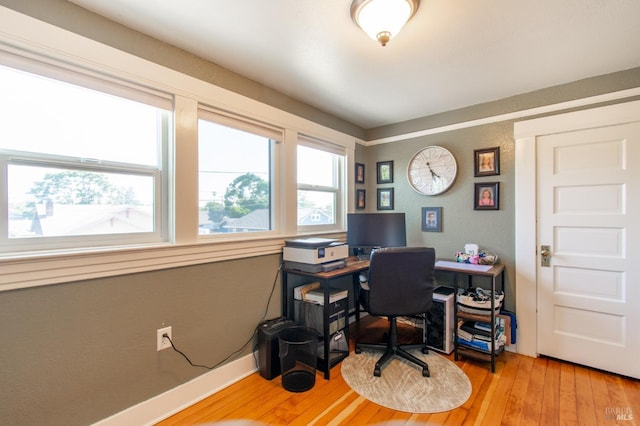 office with hardwood / wood-style floors