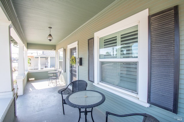 view of patio featuring a porch