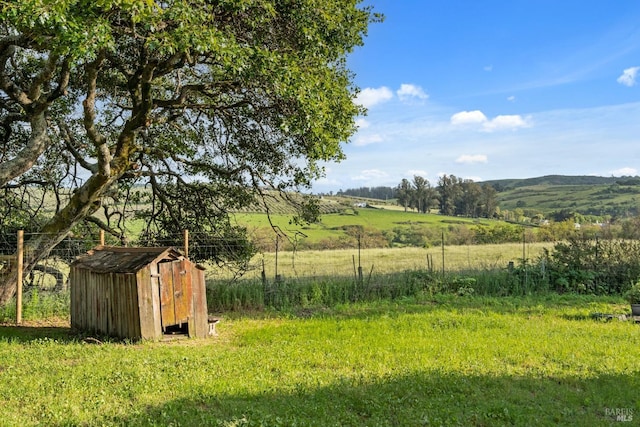 2265 Schaeffer Rd, Sebastopol, CA 95472 - view of yard with a rural view, a shed, and an outdoor structure