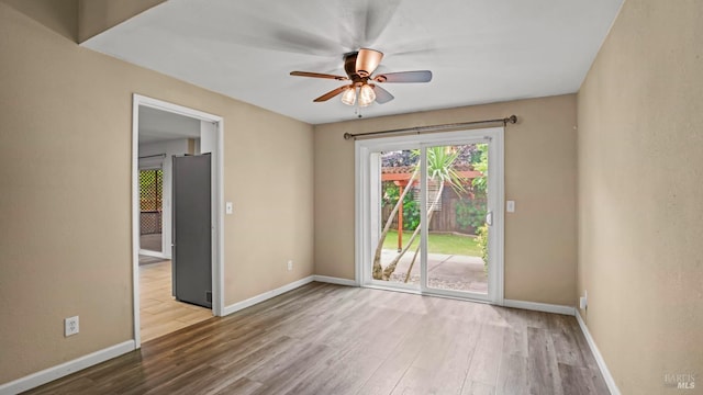 3087 Pecan Cir, Fairfield, CA 94533 - spare room with a ceiling fan, baseboards, and wood finished floors