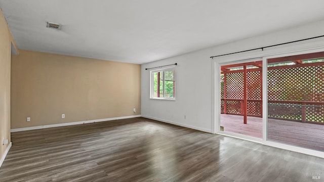 3087 Pecan Cir, Fairfield, CA 94533 - empty room featuring baseboards, visible vents, and wood finished floors